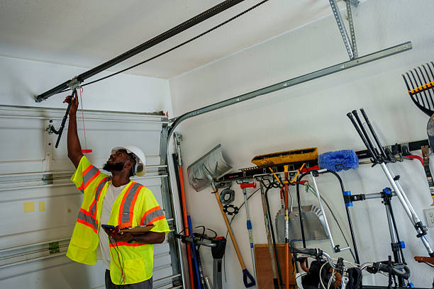 Professional Garage Door Panel Replacement technician working in Boone County County, AR